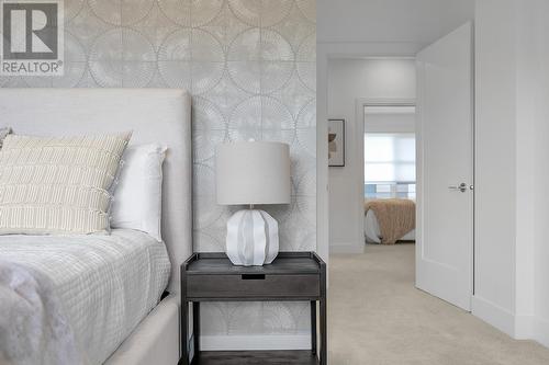 Bedroom - Photo of a similar home in the community. - 1455 Cara Glen Court Unit# 103, Kelowna, BC - Indoor Photo Showing Bedroom