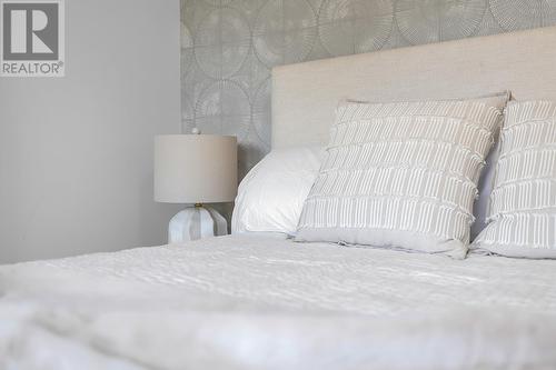 Bedroom - Photo of a similar home in the community. - 1455 Cara Glen Court Unit# 103, Kelowna, BC - Indoor Photo Showing Bedroom