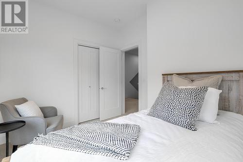 Bedroom - Photo of a similar home in the community. - 1455 Cara Glen Court Unit# 103, Kelowna, BC - Indoor Photo Showing Bedroom