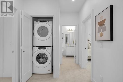 Laundry - Photo of a similar home in the community. - 1455 Cara Glen Court Unit# 103, Kelowna, BC - Indoor Photo Showing Laundry Room