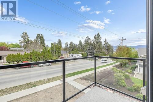 Roof Top Patio - Photo of a similar home in the community. - 1455 Cara Glen Court Unit# 103, Kelowna, BC - Outdoor With View