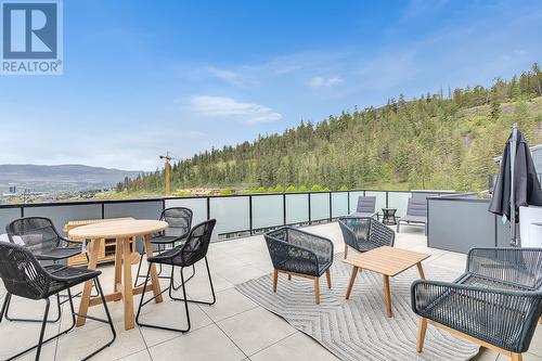 Roof Top Patio - Photo of a similar home in the community. - 1455 Cara Glen Court Unit# 103, Kelowna, BC - Outdoor With Deck Patio Veranda With Exterior