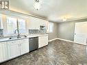 567 6Th Street E, Prince Albert, SK  - Indoor Photo Showing Kitchen With Double Sink 