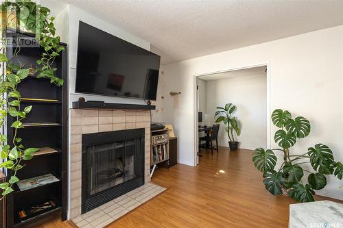 313 217B Cree Place, Saskatoon, SK - Indoor Photo Showing Living Room With Fireplace