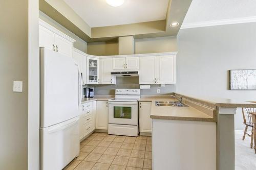 262 Dundas Street E|Unit #307, Waterdown, ON - Indoor Photo Showing Kitchen With Double Sink