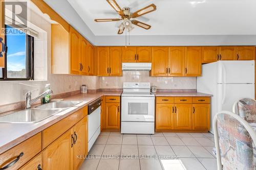 208 - 99 Donn Avenue, Hamilton (Stoney Creek), ON - Indoor Photo Showing Kitchen With Double Sink