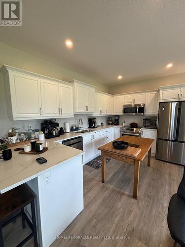 248 Heritage Park Drive, Greater Napanee, ON - Indoor Photo Showing Kitchen With Double Sink