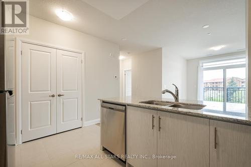 310 - 5917 Main Street, Whitchurch-Stouffville, ON - Indoor Photo Showing Kitchen With Double Sink