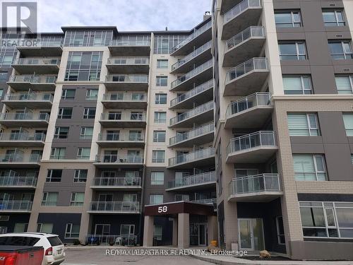 601 - 58 Lakeside Terrace, Barrie, ON - Outdoor With Balcony With Facade