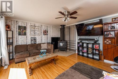 7545 Pooley Road, Prince George, BC - Indoor Photo Showing Living Room With Fireplace