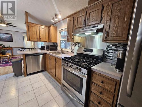 13595 Swallow Road, Prince George, BC - Indoor Photo Showing Kitchen With Double Sink