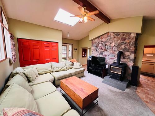 4678 Spruce Street, Windermere, BC - Indoor Photo Showing Living Room With Fireplace