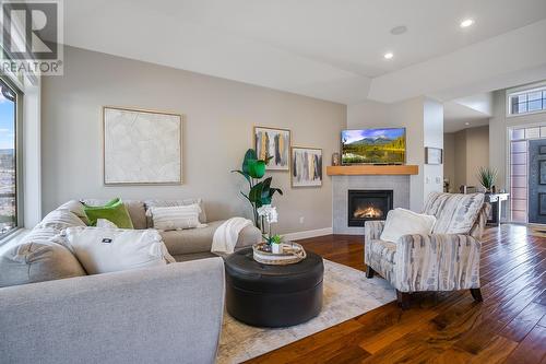 1425 Kendra Court, Kelowna, BC - Indoor Photo Showing Living Room With Fireplace