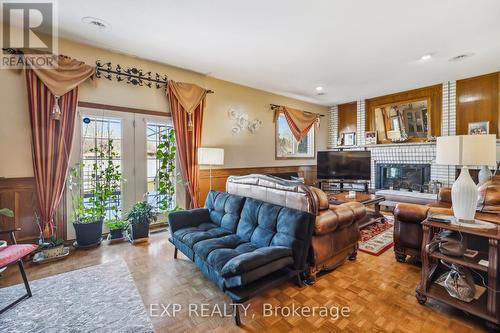 7105 York Drive, Niagara Falls, ON - Indoor Photo Showing Living Room With Fireplace
