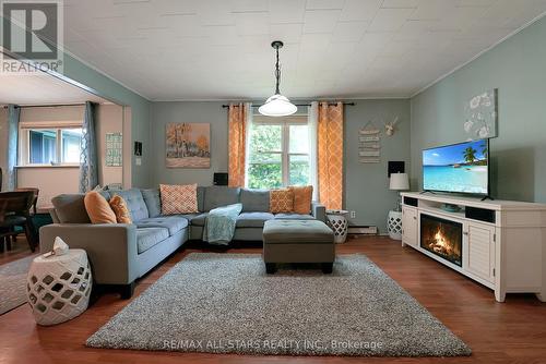 8 Parkhill Drive, Kawartha Lakes, ON - Indoor Photo Showing Living Room With Fireplace