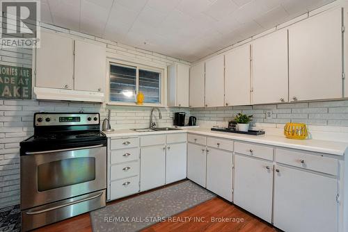 8 Parkhill Drive, Kawartha Lakes, ON - Indoor Photo Showing Kitchen With Double Sink
