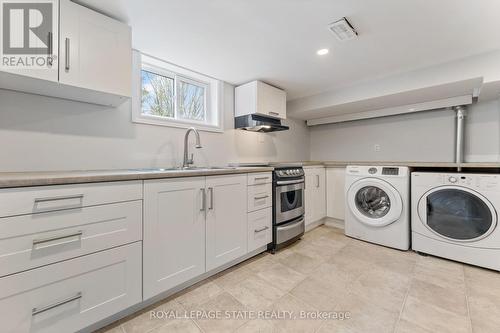 Lower - 65 East 11Th Street, Hamilton, ON - Indoor Photo Showing Laundry Room