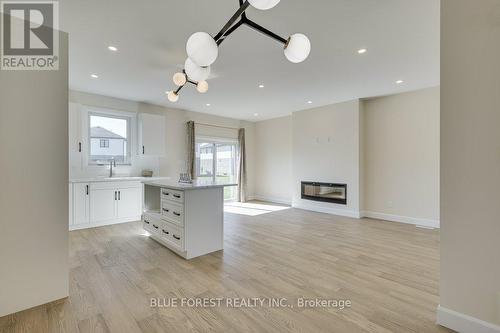 6441 Royal Magnolia Avenue, London, ON - Indoor With Fireplace