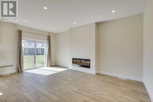 6441 Royal Magnolia Avenue, London, ON - Indoor With Fireplace