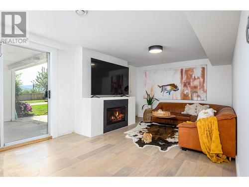 6495 Cardinal Road, Vernon, BC - Indoor Photo Showing Living Room With Fireplace