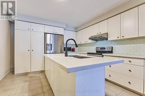33 Pringdale Gardens Circle, Toronto, ON - Indoor Photo Showing Kitchen With Double Sink