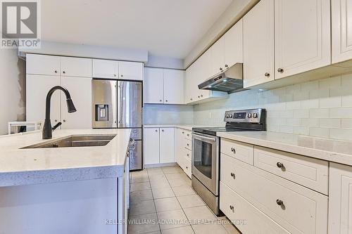 33 Pringdale Gardens Circle, Toronto, ON - Indoor Photo Showing Kitchen With Double Sink With Upgraded Kitchen