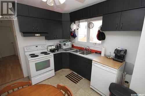 98 Trudelle Crescent, Regina, SK - Indoor Photo Showing Kitchen With Double Sink