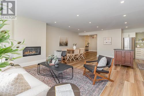 101 - 70 Elmsthorpe Avenue, Toronto, ON - Indoor Photo Showing Living Room With Fireplace