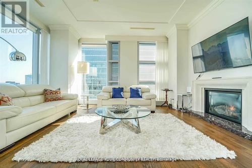 #3903 -183 Wellington St W, Toronto, ON - Indoor Photo Showing Living Room With Fireplace