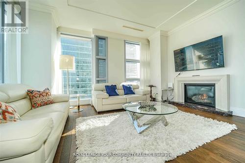 #3903 -183 Wellington St W, Toronto, ON - Indoor Photo Showing Living Room With Fireplace
