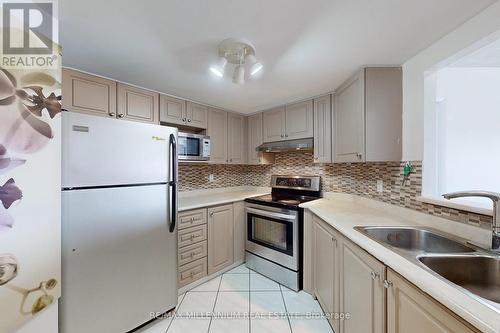 315 - 160 Wellington Street E, Aurora, ON - Indoor Photo Showing Kitchen With Stainless Steel Kitchen With Double Sink