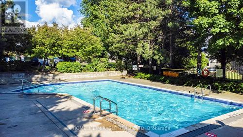 308 - 10 Malta Avenue, Brampton, ON - Outdoor With In Ground Pool With Backyard