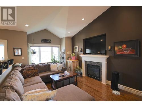 1004 90 Avenue, Dawson Creek, BC - Indoor Photo Showing Living Room With Fireplace