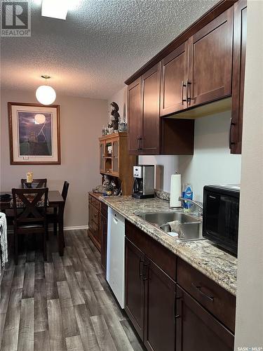 511 1580 Olive Diefenbaker Drive, Prince Albert, SK - Indoor Photo Showing Kitchen With Double Sink