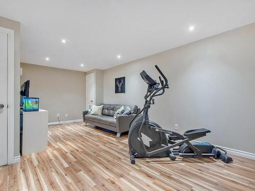 Family room - 13380 Rue Turcot, Mirabel, QC - Indoor Photo Showing Gym Room