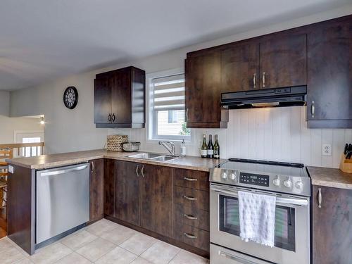 Kitchen - 9505 Rue Des Outardes, Mirabel, QC - Indoor Photo Showing Kitchen With Double Sink