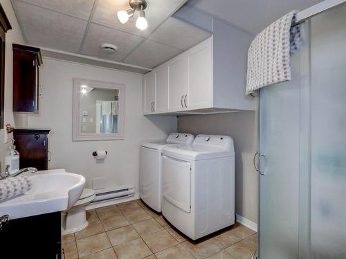Ensuite bathroom - 9505 Rue Des Outardes, Mirabel, QC - Indoor Photo Showing Laundry Room