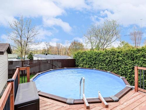 Pool - 9505 Rue Des Outardes, Mirabel, QC - Outdoor With Above Ground Pool With Backyard