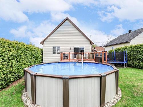 Pool - 9505 Rue Des Outardes, Mirabel, QC - Outdoor With Above Ground Pool With Backyard With Exterior