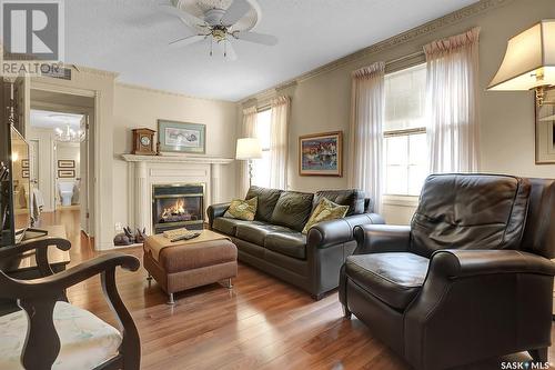 201 2315 Cornwall Street, Regina, SK - Indoor Photo Showing Living Room With Fireplace