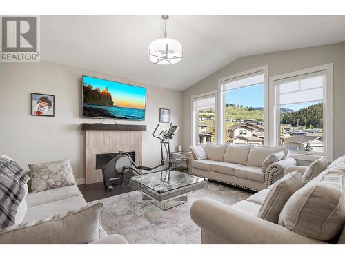 1852 Split Rail Place, Kelowna, BC - Indoor Photo Showing Living Room With Fireplace