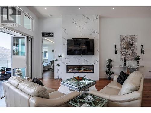 3338 Chocolate Lily Lane, Kelowna, BC - Indoor Photo Showing Living Room With Fireplace