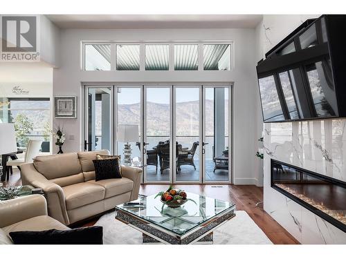 3338 Chocolate Lily Lane, Kelowna, BC - Indoor Photo Showing Living Room With Fireplace