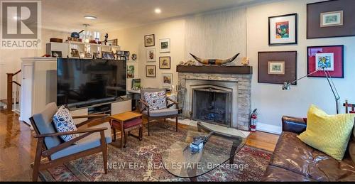 11 Brynston Road, Toronto, ON - Indoor Photo Showing Living Room With Fireplace