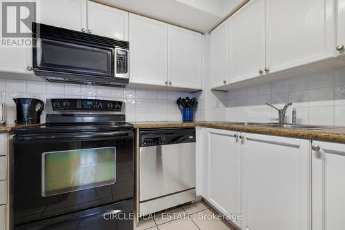 525 - 3888 Duke Of York Boulevard, Mississauga, ON - Indoor Photo Showing Kitchen With Double Sink