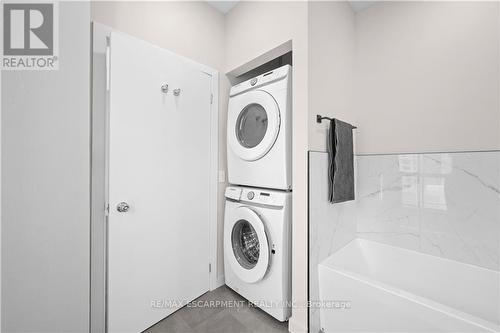 614 - 66 Bay Street S, Hamilton, ON - Indoor Photo Showing Laundry Room