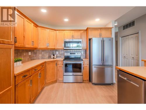 100 Lakeshore Drive Unit# 415, Penticton, BC - Indoor Photo Showing Kitchen With Stainless Steel Kitchen