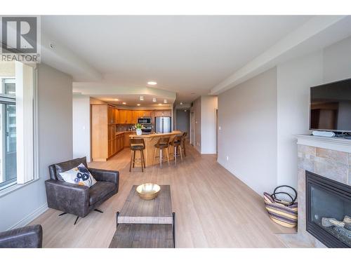 100 Lakeshore Drive Unit# 415, Penticton, BC - Indoor Photo Showing Living Room With Fireplace