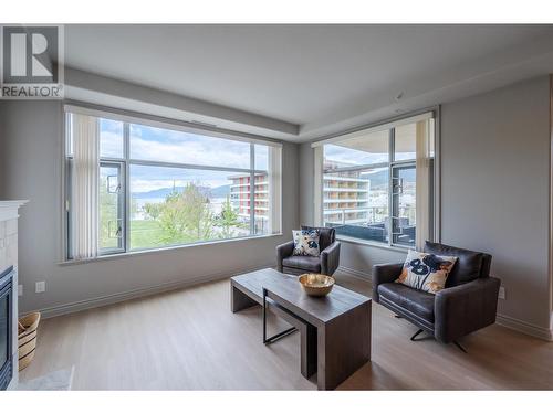 100 Lakeshore Drive Unit# 415, Penticton, BC - Indoor Photo Showing Living Room With Fireplace