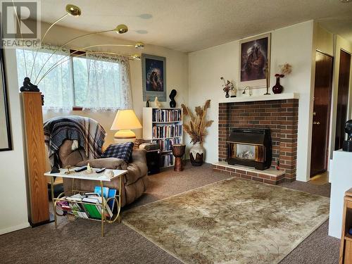 6595 Herry Road, Vernon, BC - Indoor Photo Showing Living Room With Fireplace